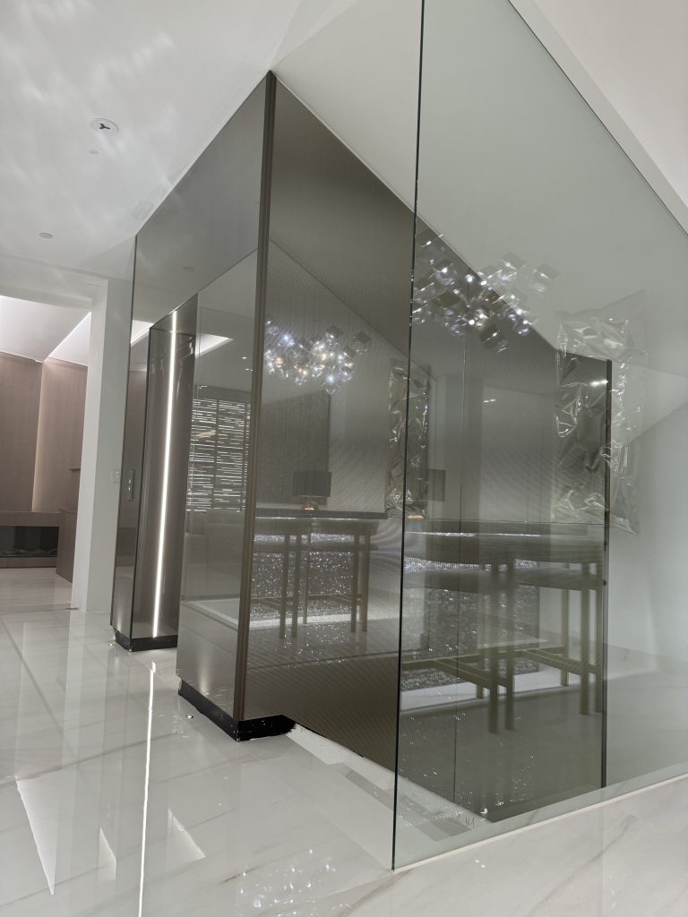 bespoke glass lift shaft cladding london